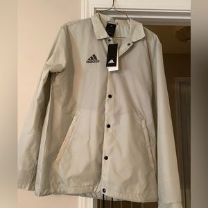 Adidas rain jacket. Adult XS, fits like a S. Light gray